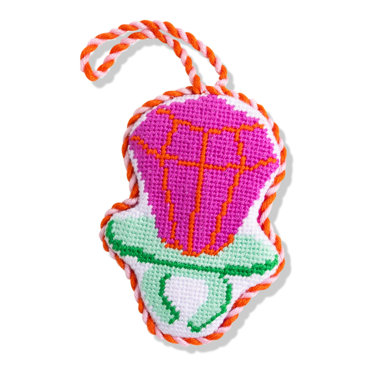 Needlepoint candy ring ornament with pink-purple top and green base, braided cord loop