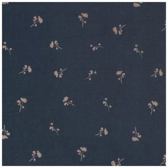 Dark fabric with a scattered dandelion floral print