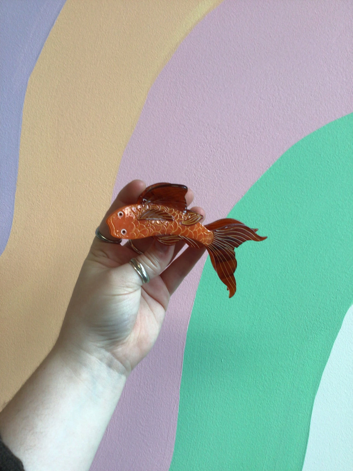 Koi fish hair claw with orange body and red flowing tail