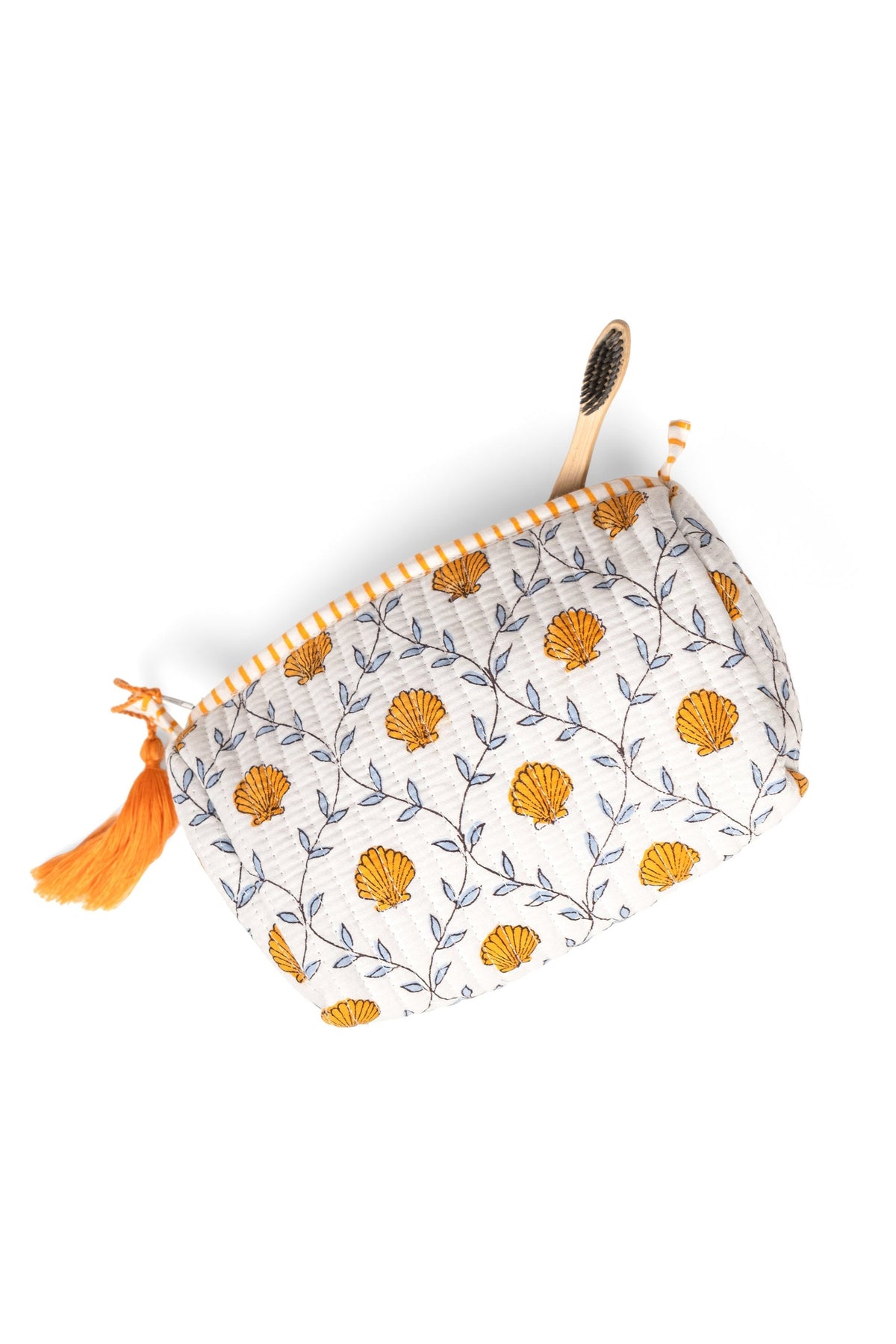 Blockprint makeup pouch, white with orange floral circles, zipper top, tassel trim