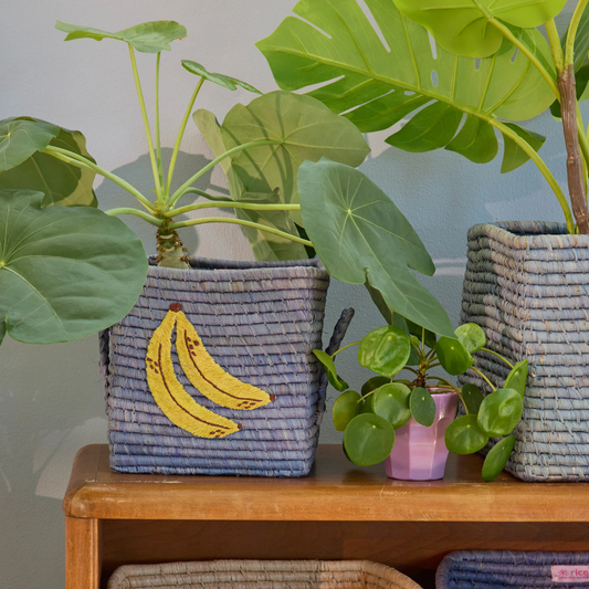 Blue square raffia basket with banana motif