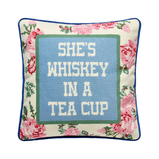 Floral embroidered throw pillow with “She’s Whiskey in a Tea Cup” text