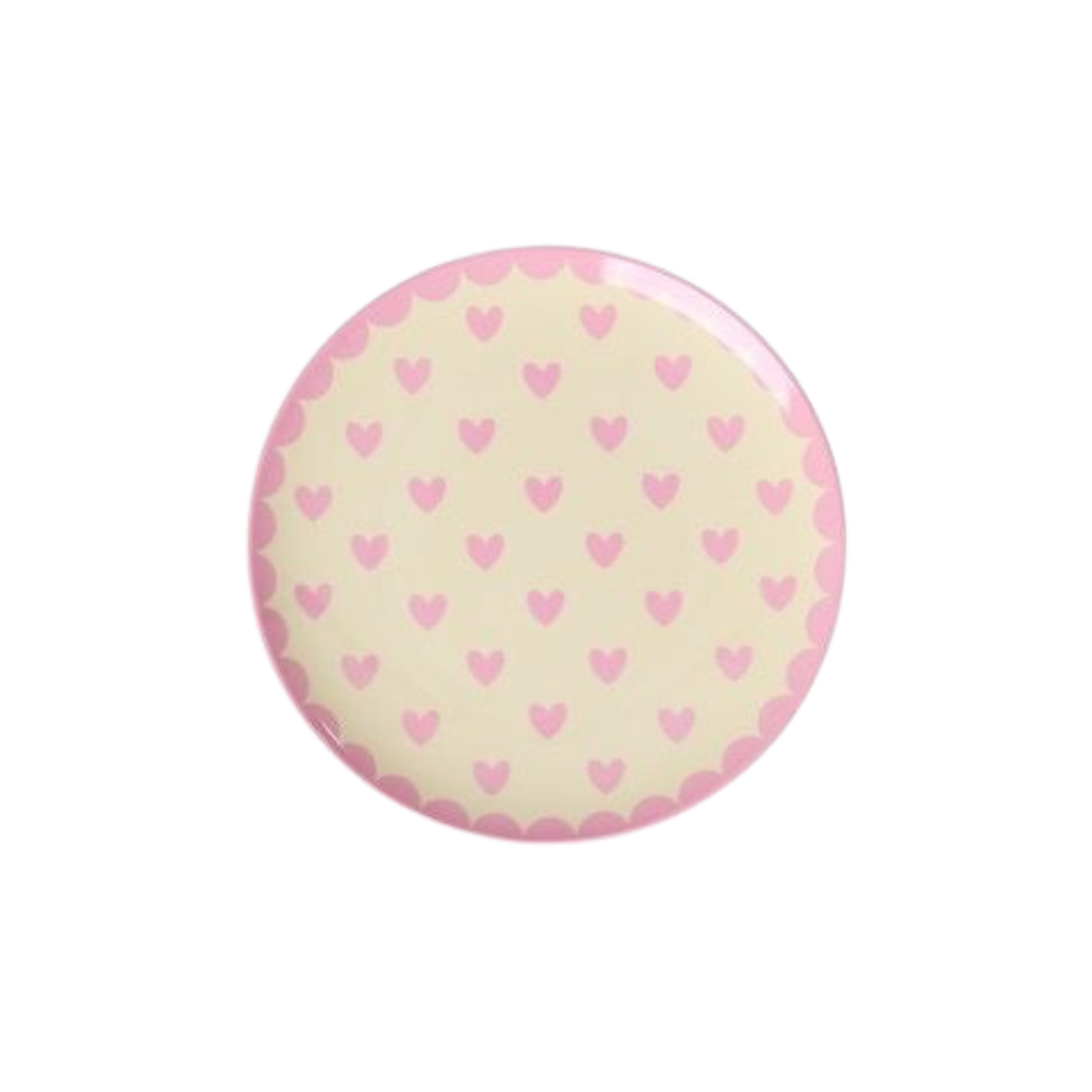 Small melamine cake plate with light pink heart pattern on dark pink rim