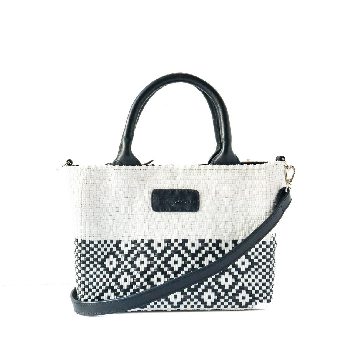 Small woven crossbody bag, white with black geometric pattern, black leather handles and strap