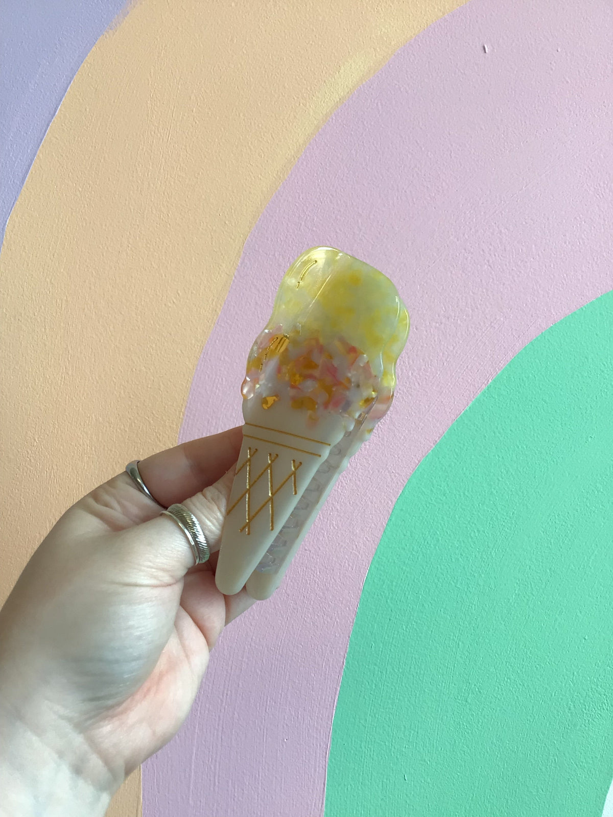 Mint and pale yellow ice cream hair claw with gold lattice cone