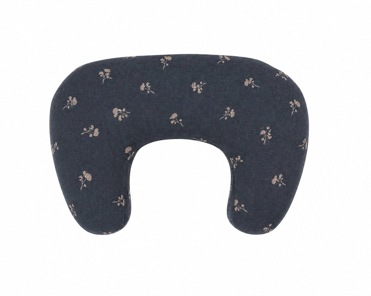 Dandelion nursing pillow cover shown from the back in a dark floral print