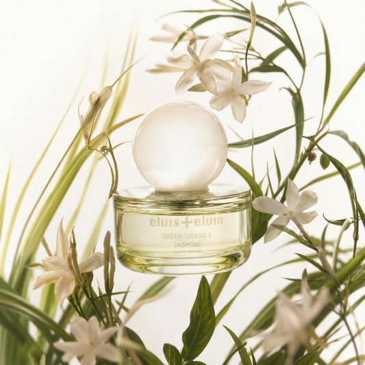 Green Grass & Jasmine Eau de Parfum bottle with white flowers and green foliage