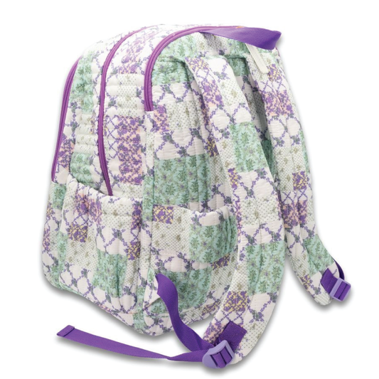 Quilted patchwork backpack with purple straps and zipper front pocket, side view