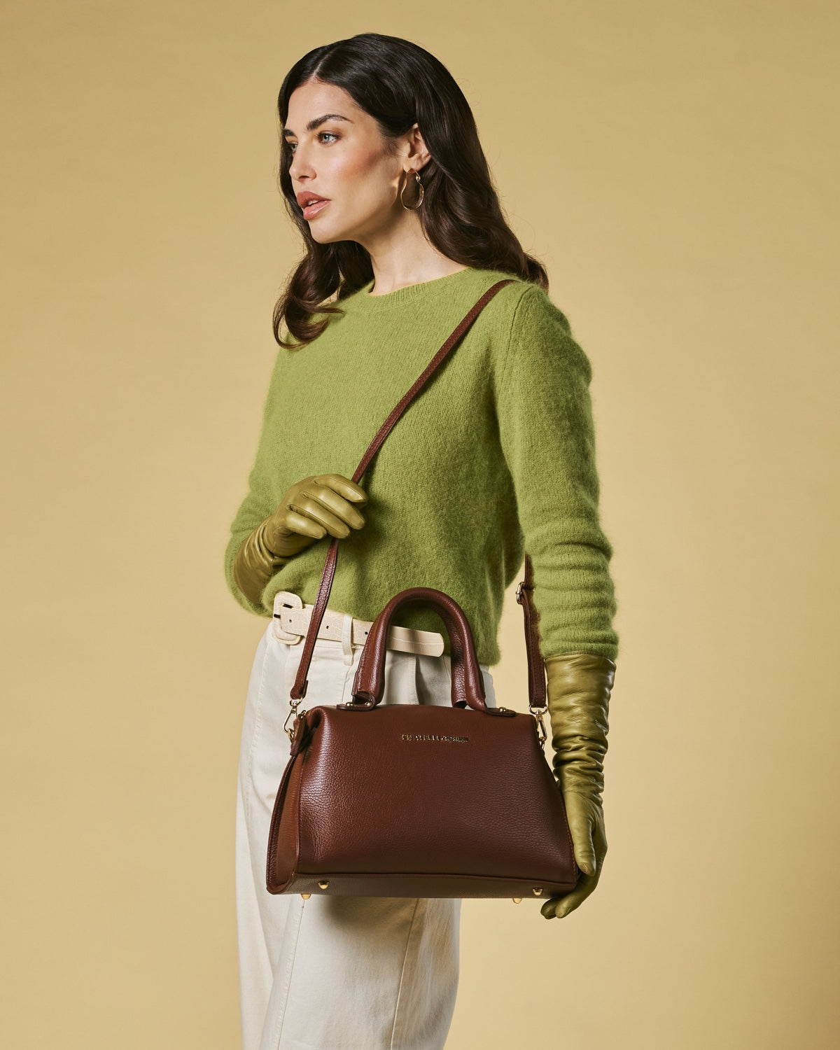 Brown calf leather handbag with shoulder strap and top handles, structured silhouette