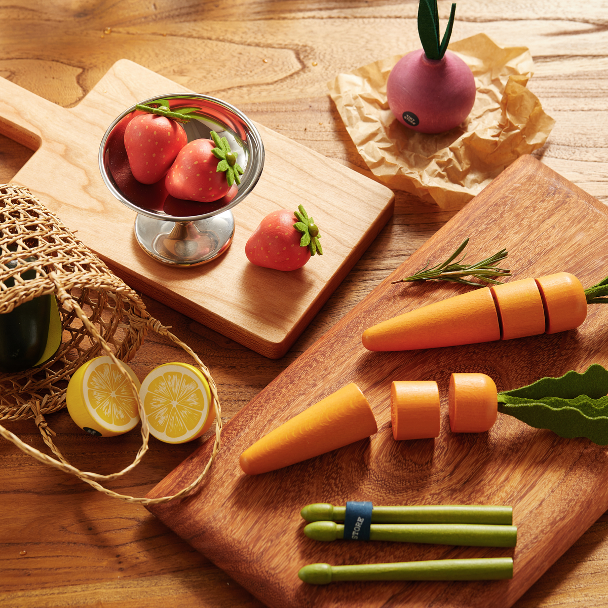 Organic-style play food set with carrots, strawberries, radish, peas, and avocado pieces.