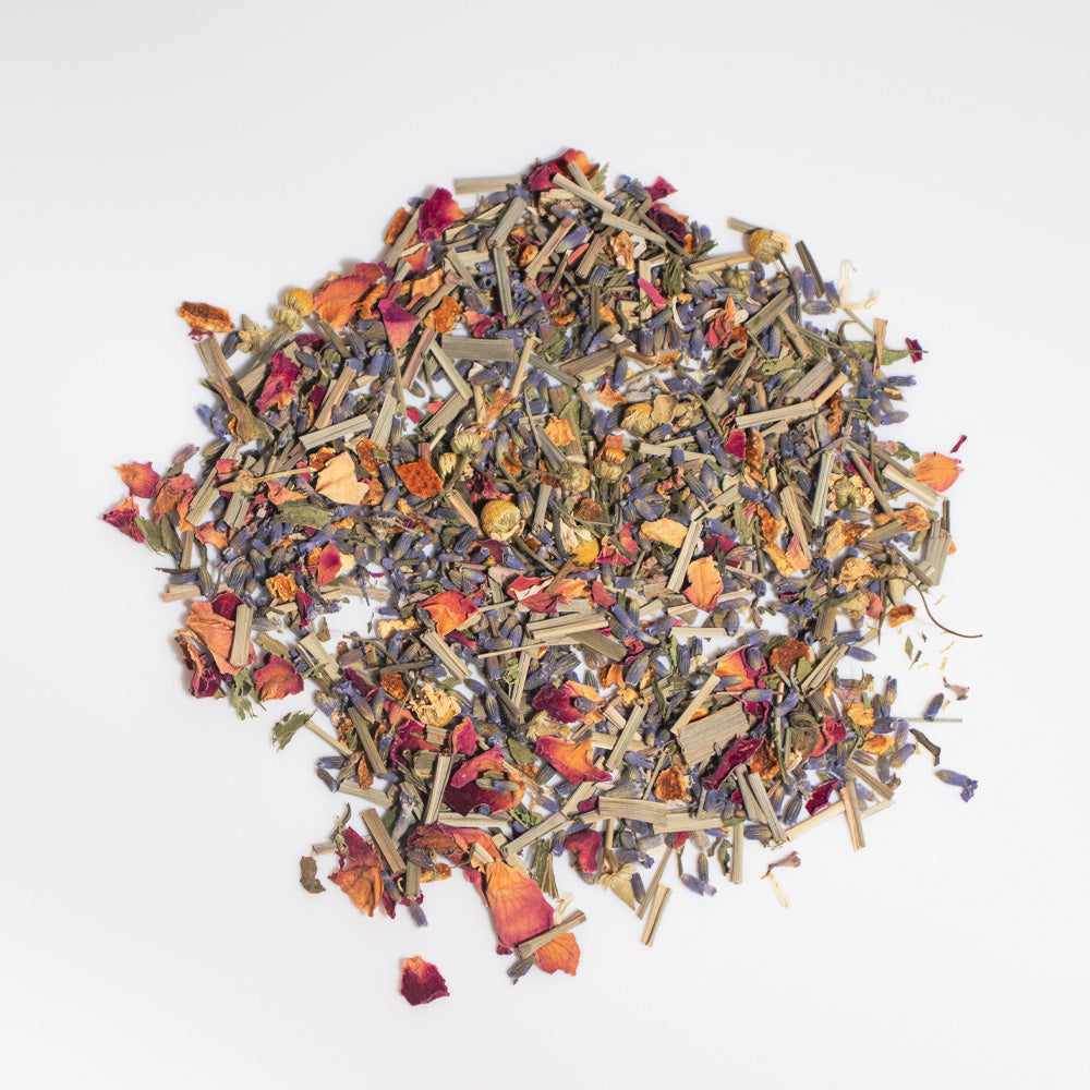 Pile of dried sleeping herbal tea leaves with colorful herb flakes