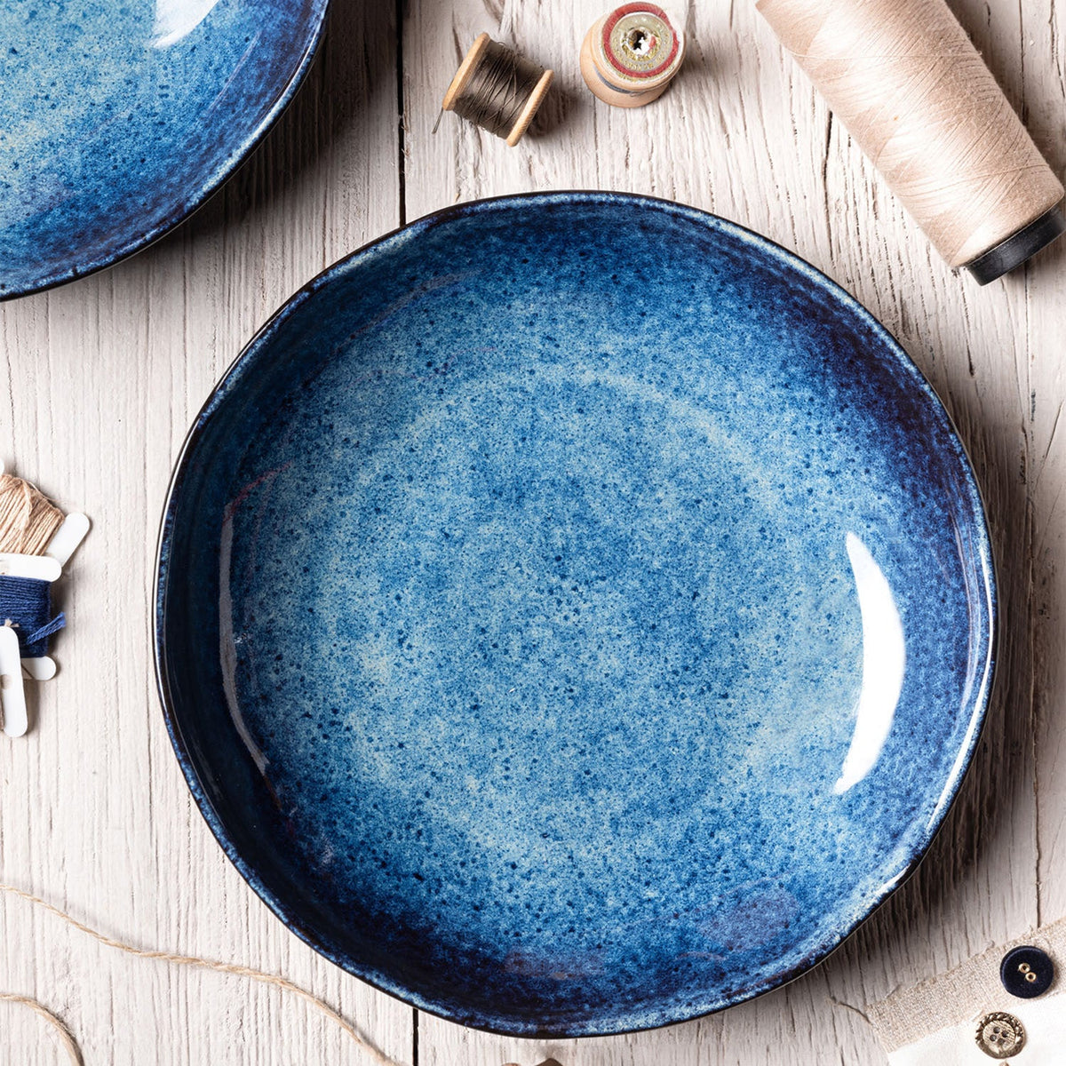 Blue speckled reactive glazed pasta plate, round shallow bowl with glossy center