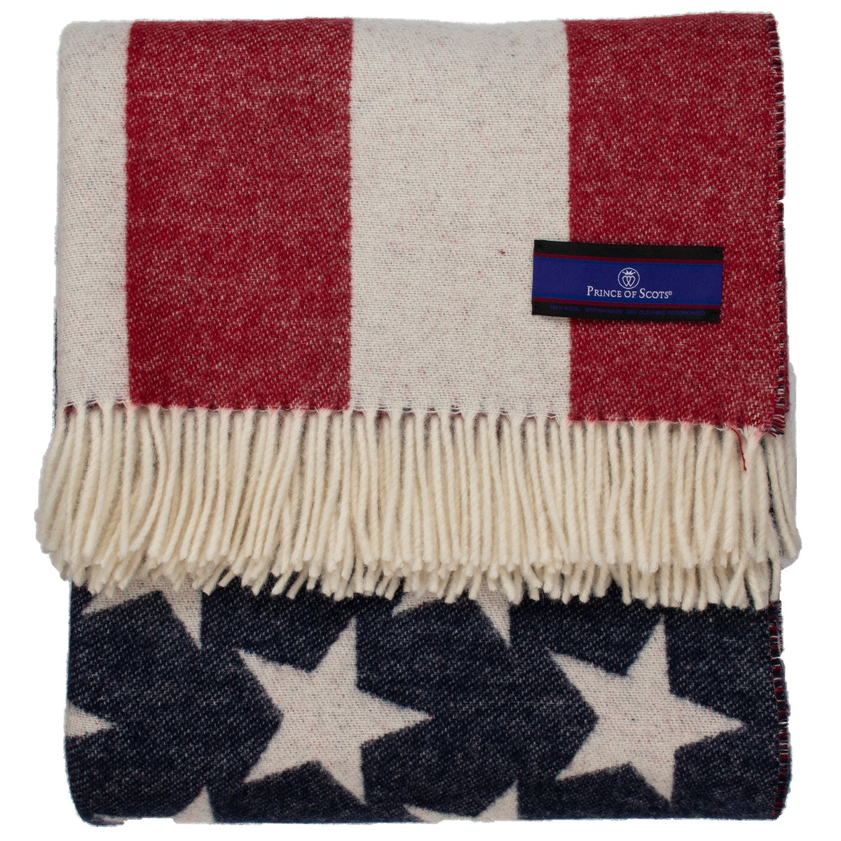 Folded flag throw with woven label tag, cream top, red stripes, and navy star panel