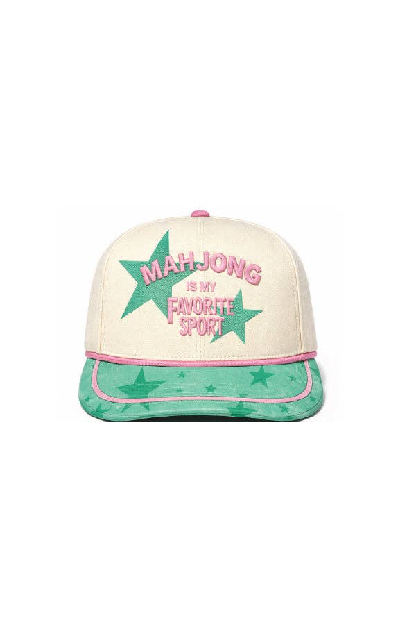Cream baseball cap with green star banner, pink lettering, and green patterned brim.