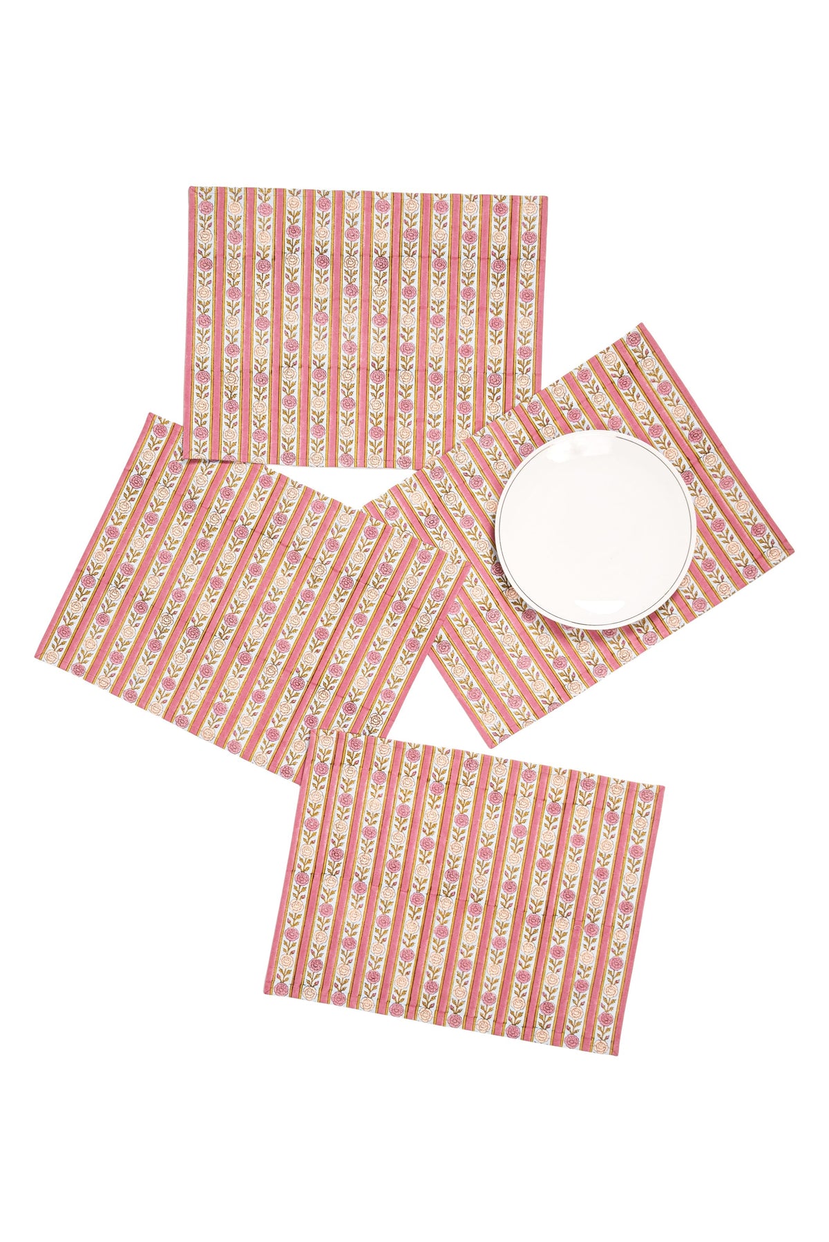 Pink floral striped placemats stacked with round plate on top
