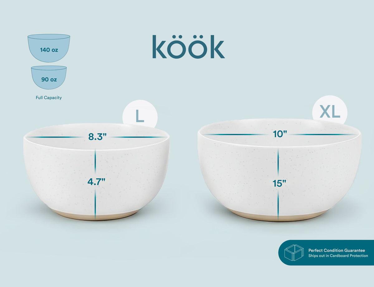Large and extra-large speckled off-white ceramic nesting bowls, round with flared rims