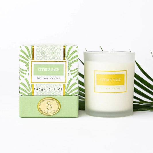 Boxed citrus sage soy wax candle with clear glass jar and gold label