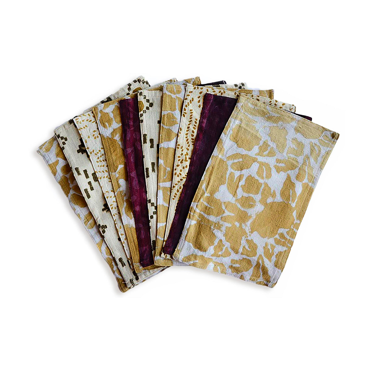 Set of cotton towels, folded, mixed beige and maroon patterned fabrics