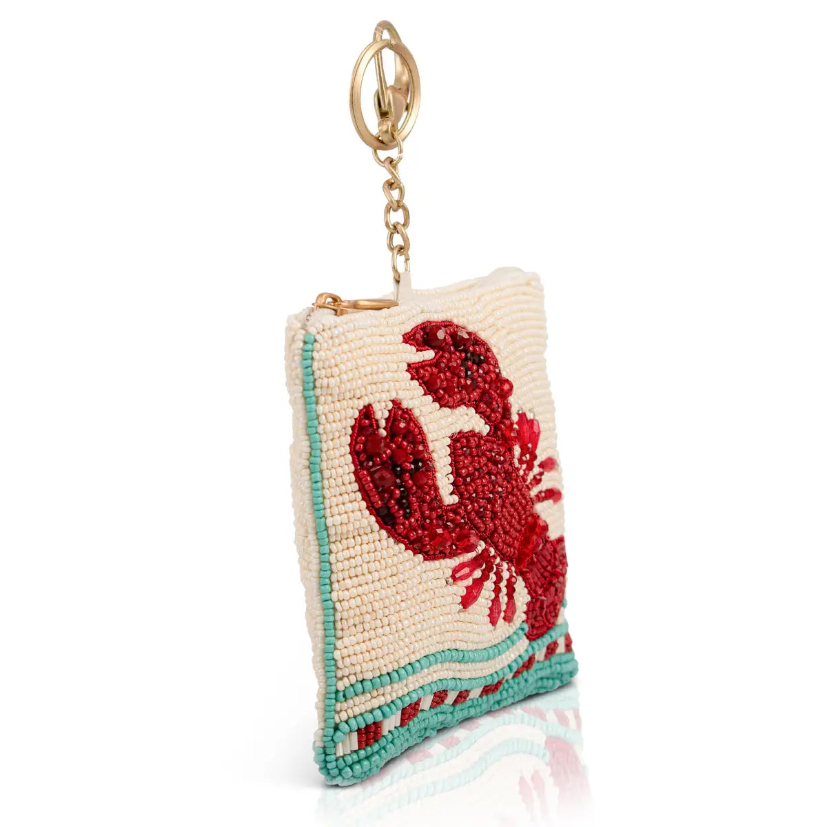 Beaded coin purse with red crab design and gold-tone key ring, light beige body