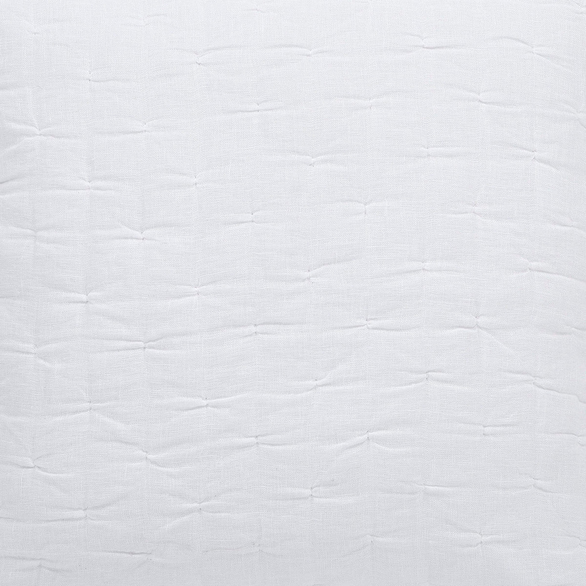 Close-up of white pinched linen quilt fabric with quilted stitch and raised texture