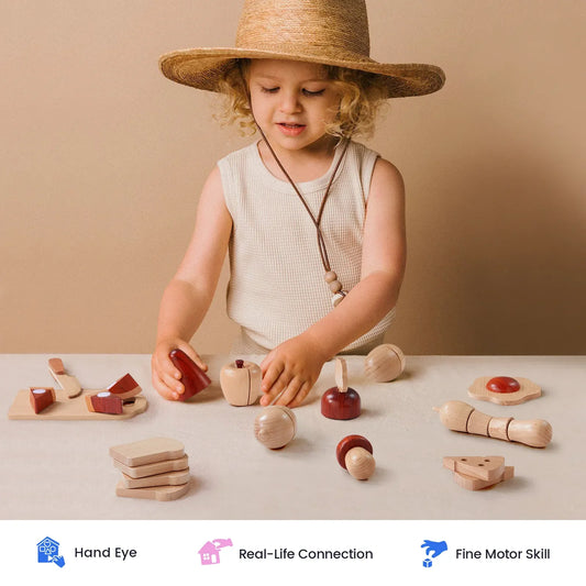 Wooden play food pieces and pretend kitchen tools for pretend cutting play