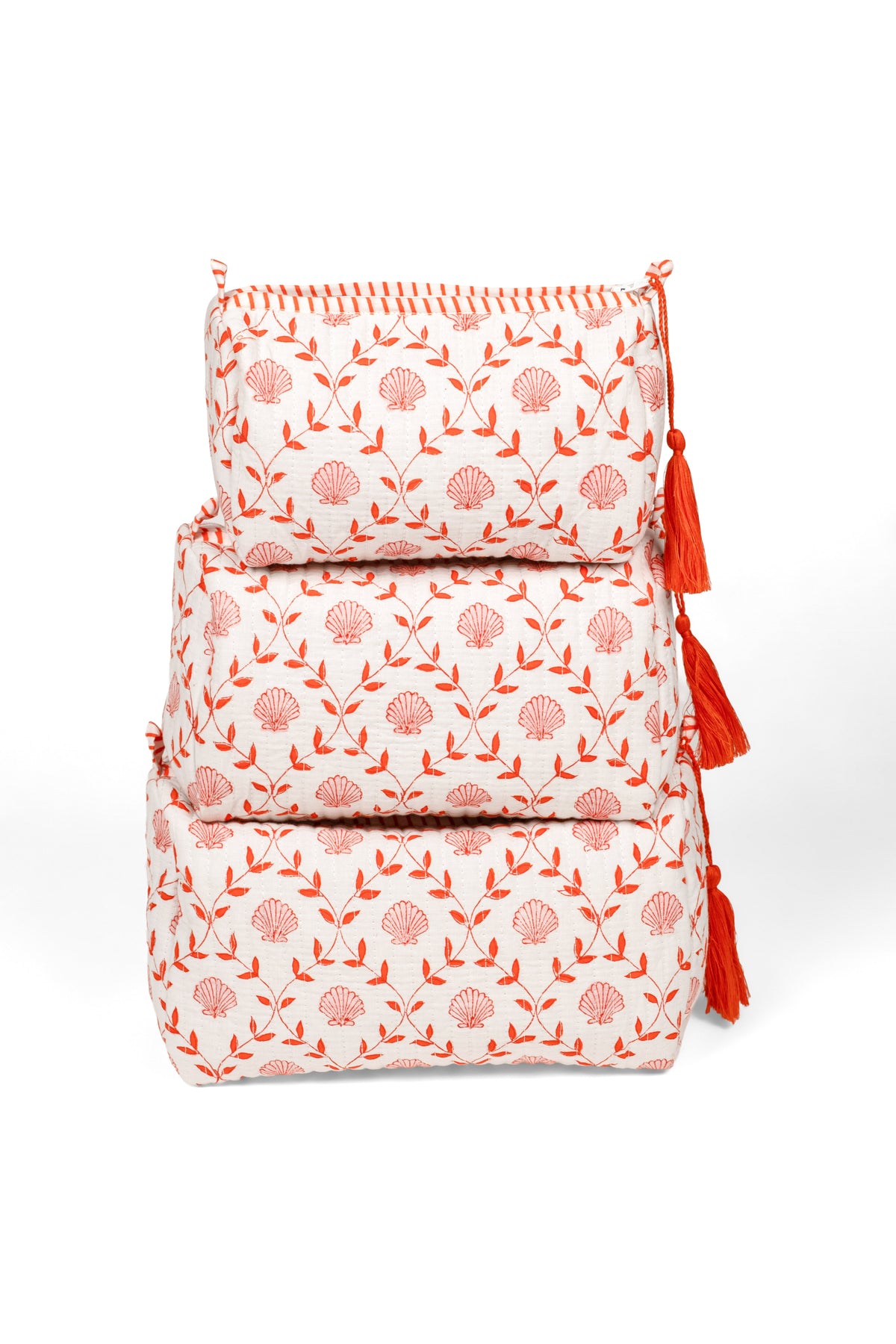 Stacked blockprint makeup bag set, white with orange floral circles, zipper top tassel