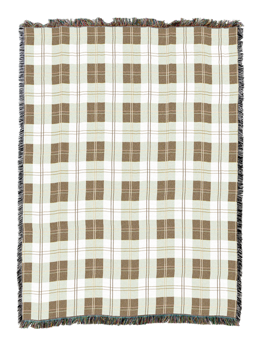 Plaid throw blanket in cream, tan, and dark grey with fringed edges