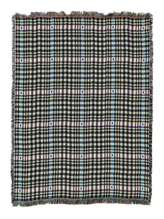 Herringbone-pattern woven blanket in dark grey plaid with blue and tan accents, fringed edge