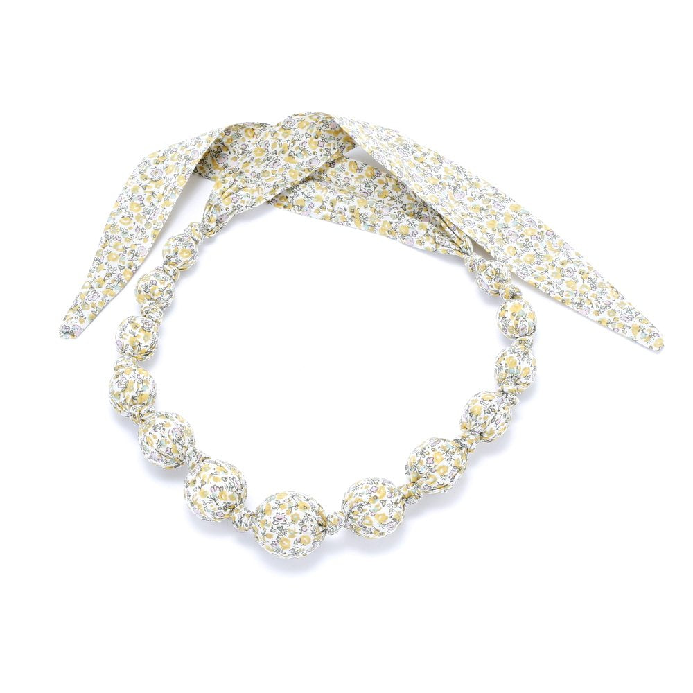 Girls' fabric necklace with yellow floral print, fabric-covered beads and tie ends
