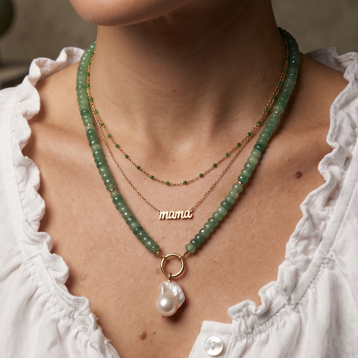 Layered green bead necklace with pink pearl pendant and thin chain 'mama' charm