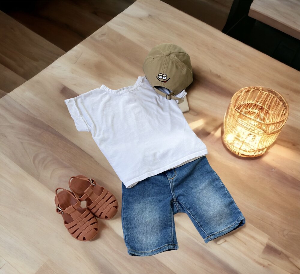Kids' barefoot jelly sandals in rust color, shown paired on the floor