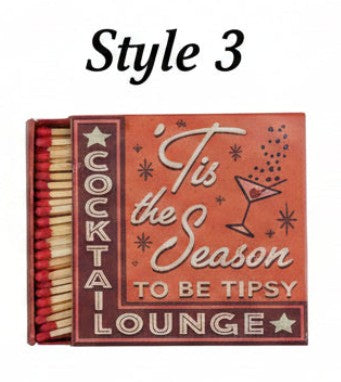 Holiday matchbox with 'Tis the Season to be Tipsy' lettering; exposed matchsticks