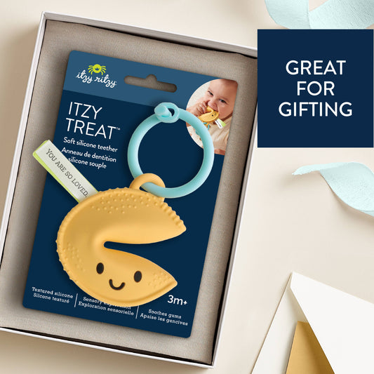 Silicone fortune-cookie teether in gift box, with blue handle ring and ribbon