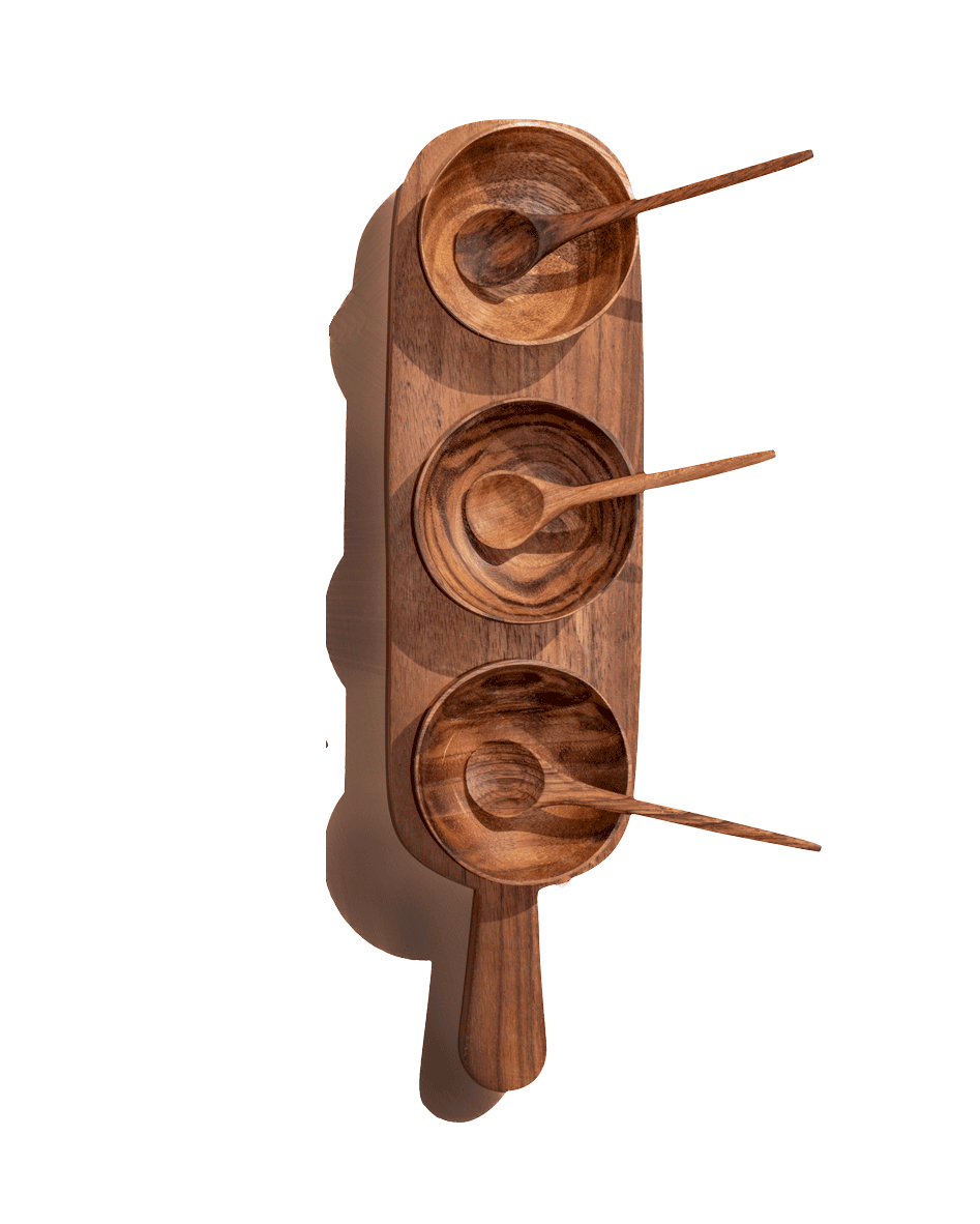 Carved wooden condiment serving set with three round bowls and spoon handles