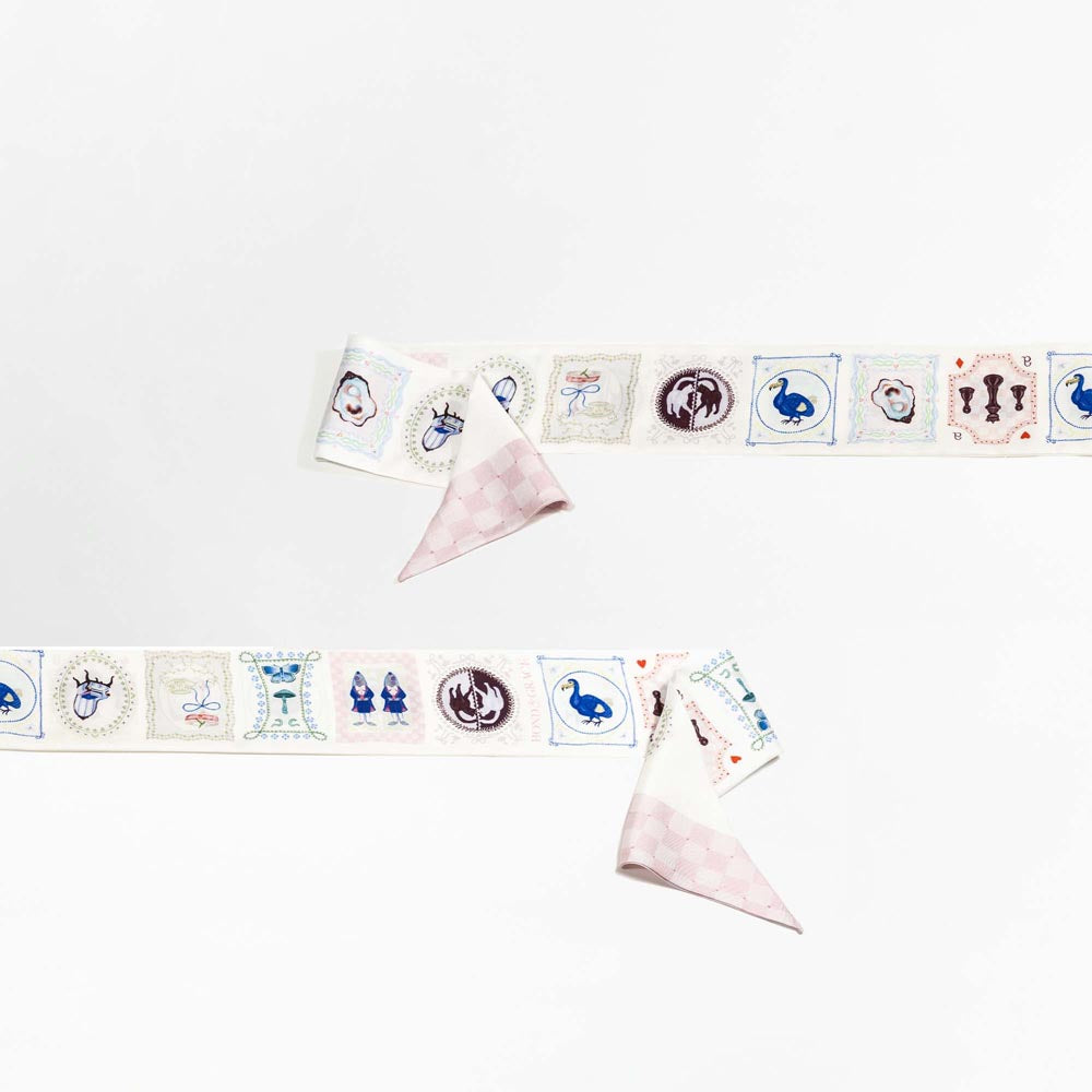 Silk twilly scarf with blue and burgundy icons on cream, plus light pink check sections