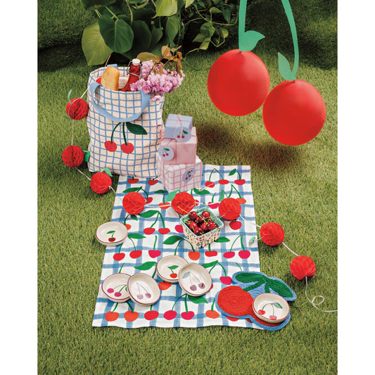 Cherry pinch bowls set displayed on a picnic table with pink trim