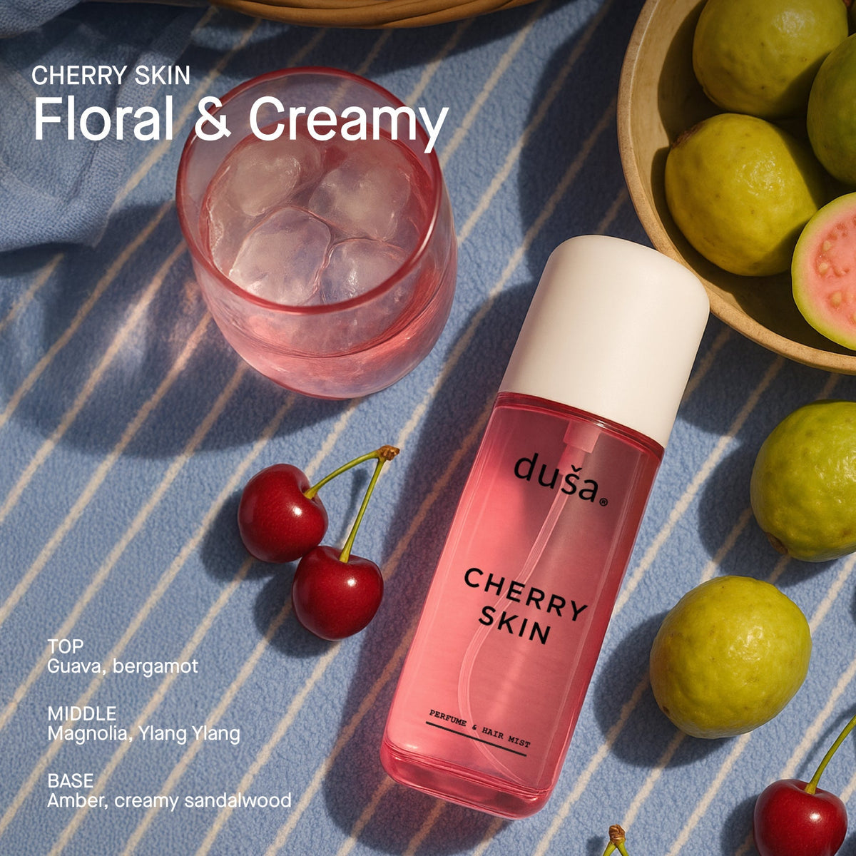 Cherry Skin hair and body perfume mist bottle with pink liquid and white cap