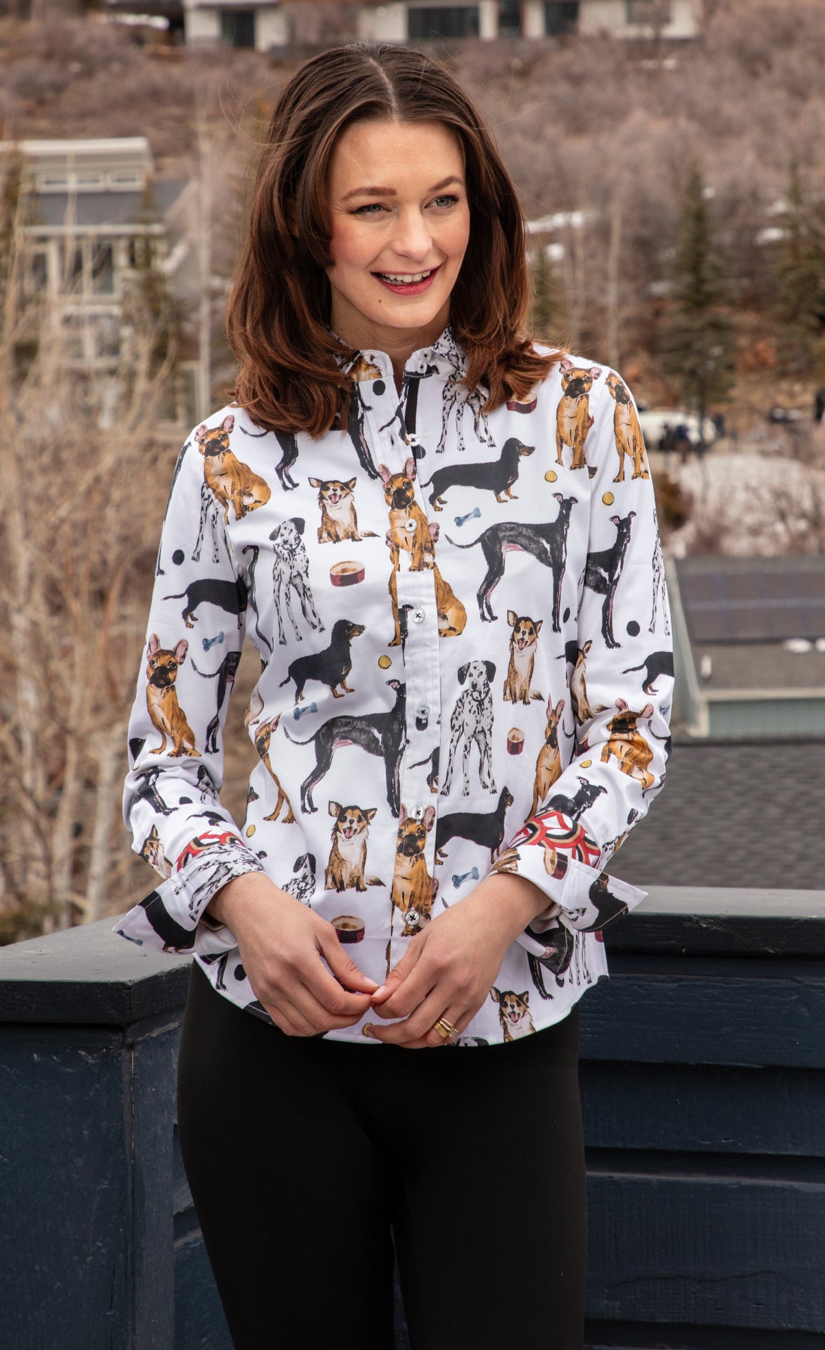 White button-up shirt with long sleeves and playful dog print, collared neckline