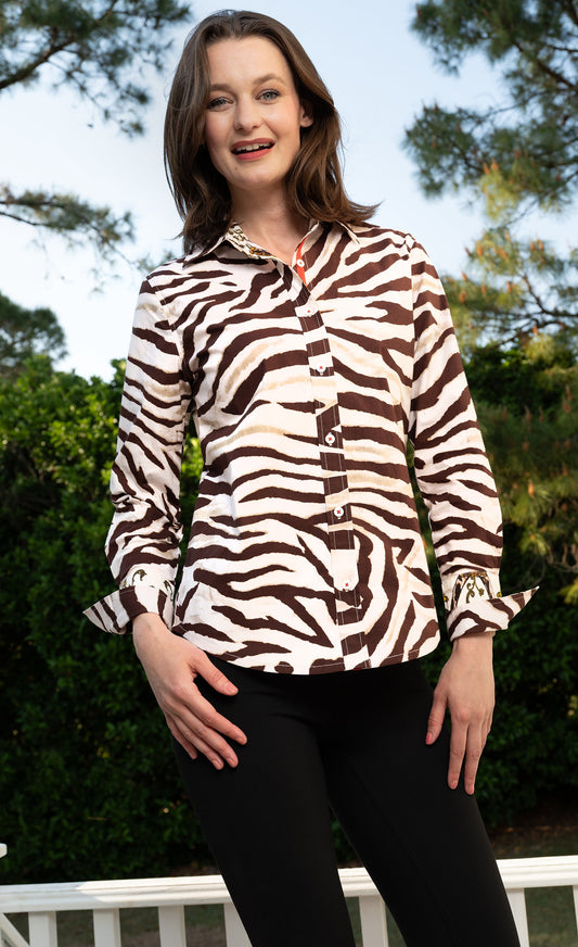 Tiger print button-up shirt with collar, long sleeves, red trim at neckline