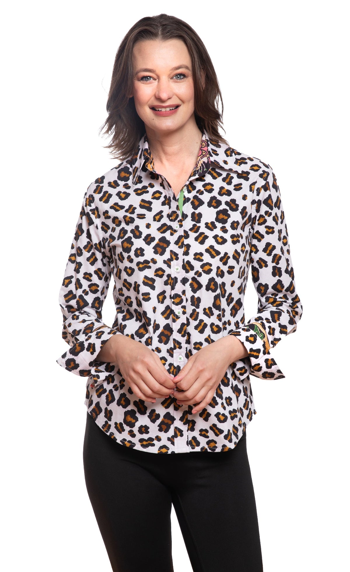Oversized leopard-dot button-up shirt in white with long sleeves and cuffs