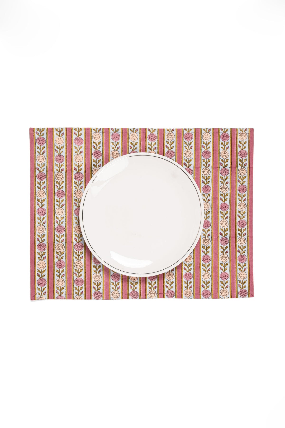 Blue floral striped placemat with round plate centered