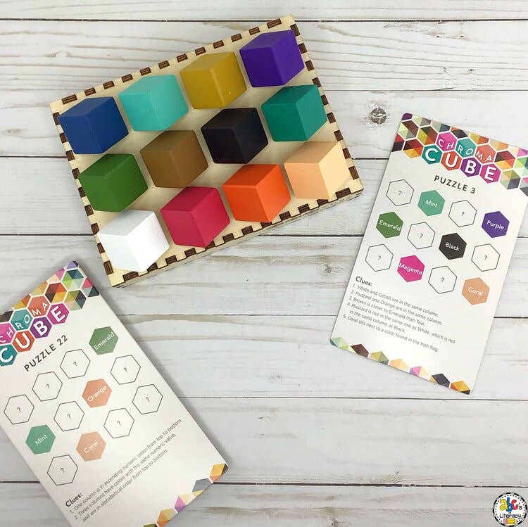 Wooden cube tray with matching instruction cards on light background