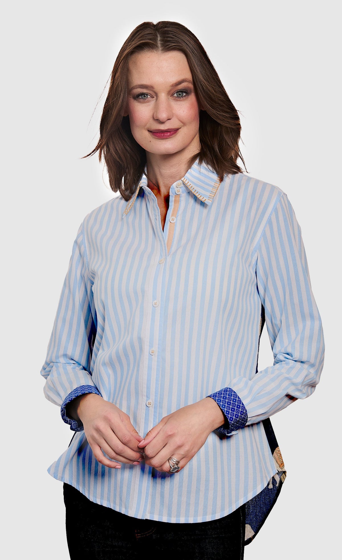 Women's striped hi-lo button-up shirt with long sleeves and button front
