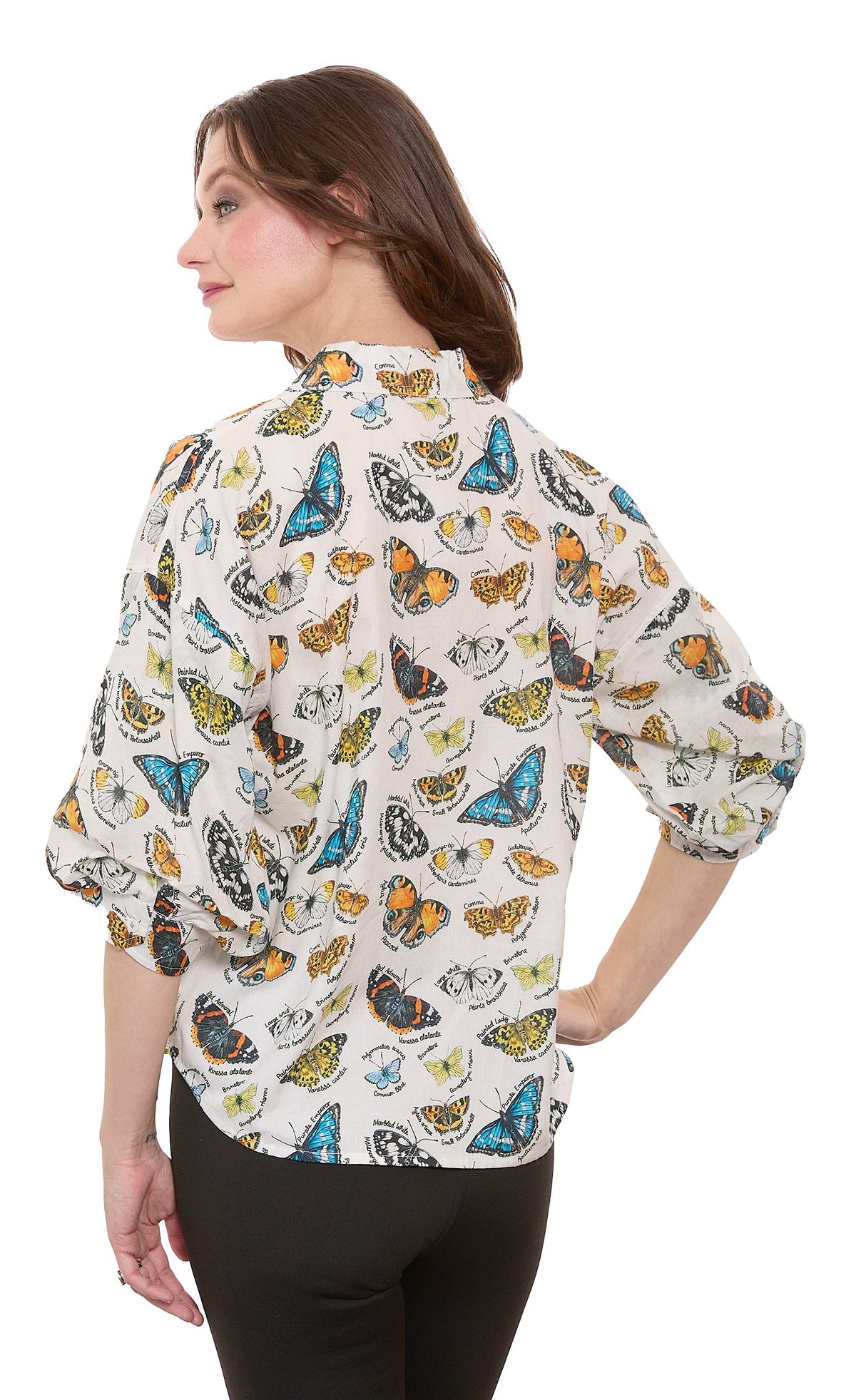 Ivory butterfly-print V-neck top with relaxed puff sleeves, side view