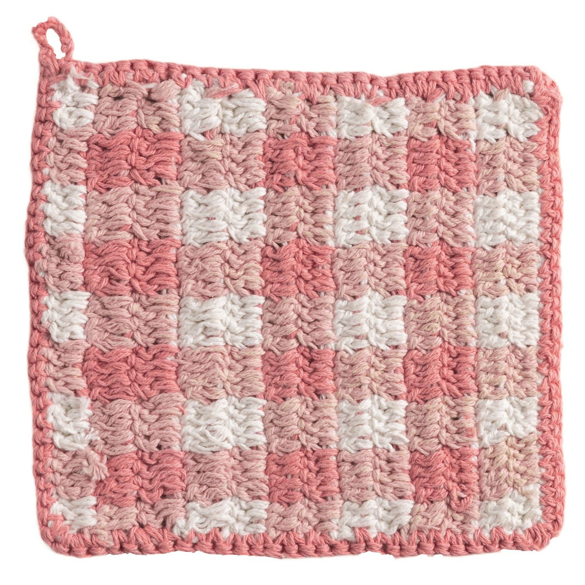 Pink crochet check pot holder square with raised white grid patches and hanging loop.