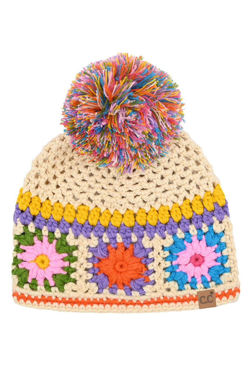 C.C crochet pom beanie with multicolor floral pattern and cream knit