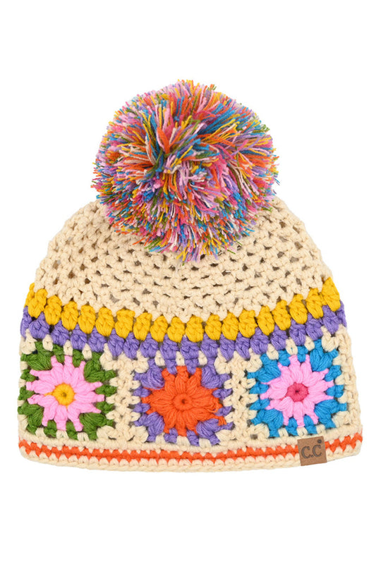 C.C crochet pom beanie with multicolor floral pattern and cream knit