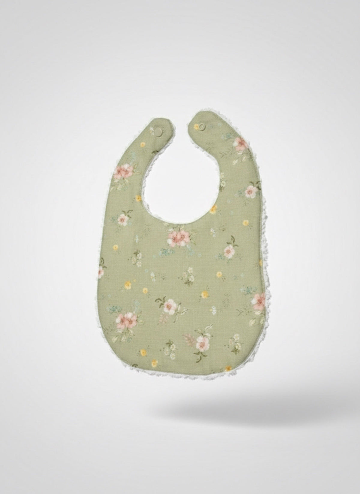 Infant linen bib, sage floral design, rounded bib shape with stitched border