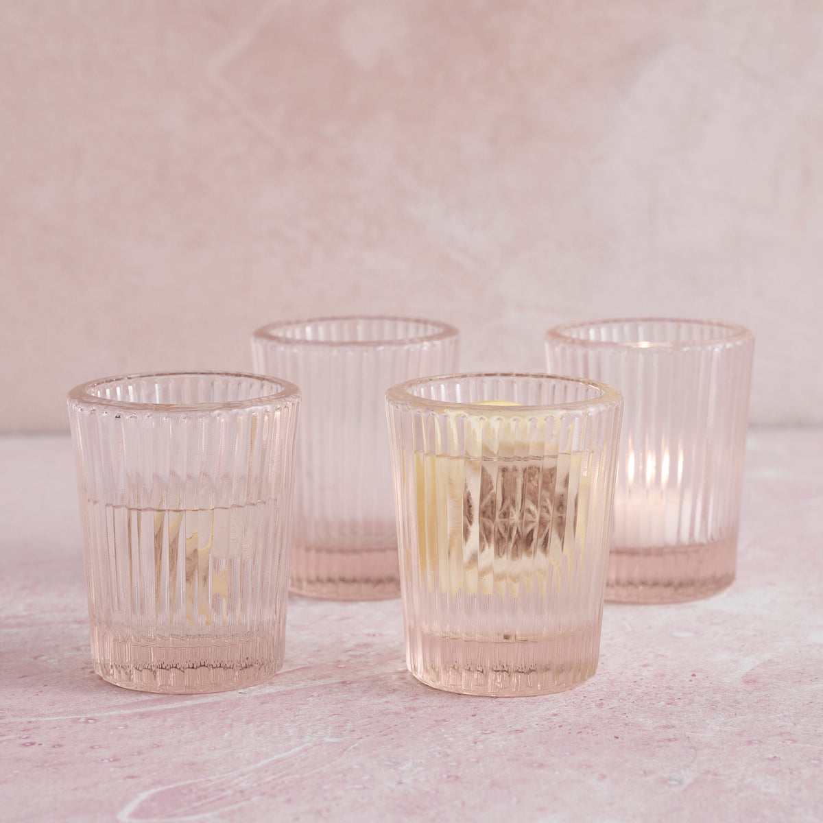 Pink pressed juice glasses, set of 4, faceted ribbed tumbler design