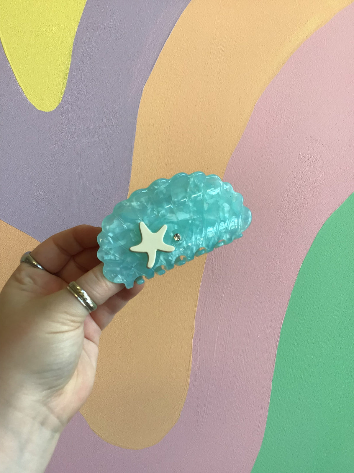 Blue Crush shell hair claw, teal blue scalloped shell with star emblem